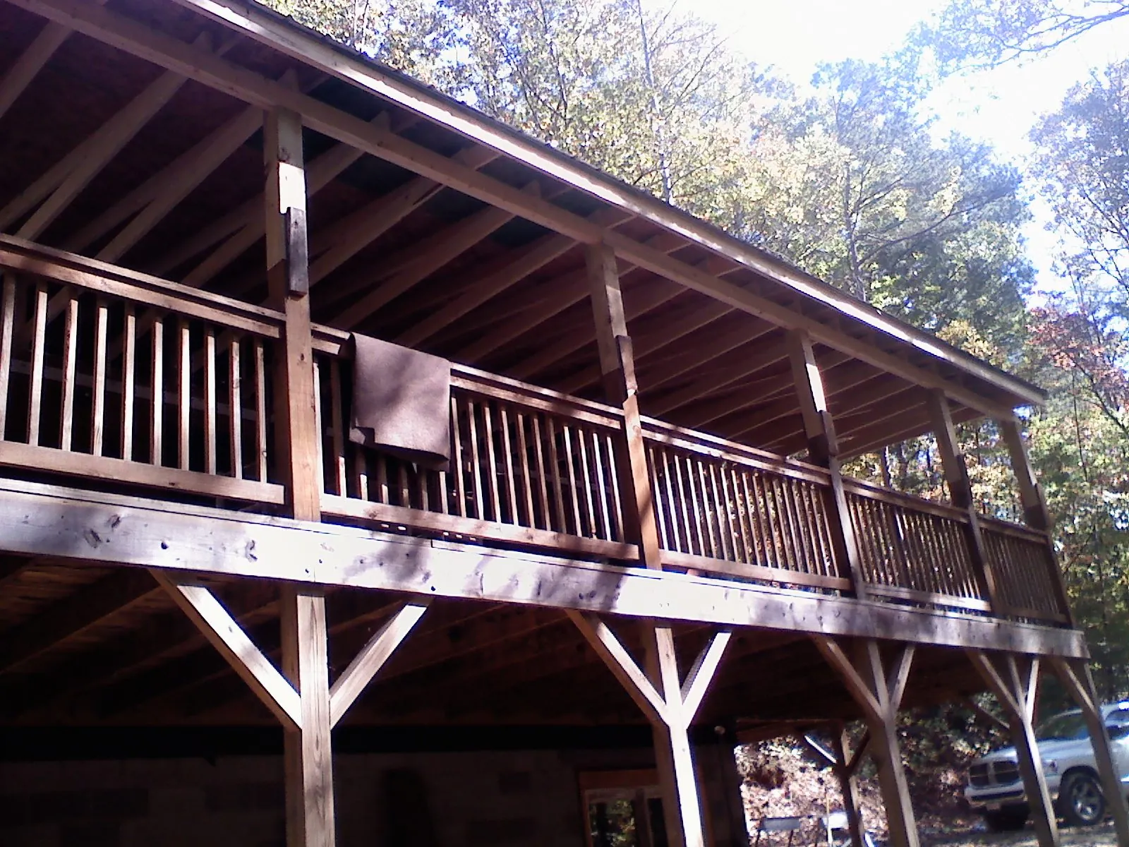 Timber framing under a new elevated porch and deck — Roof Leak Repair in Newtonsville by Roofing Brothers